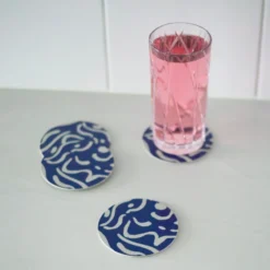 Glasunderlägg Virvla 9 cm 4-p