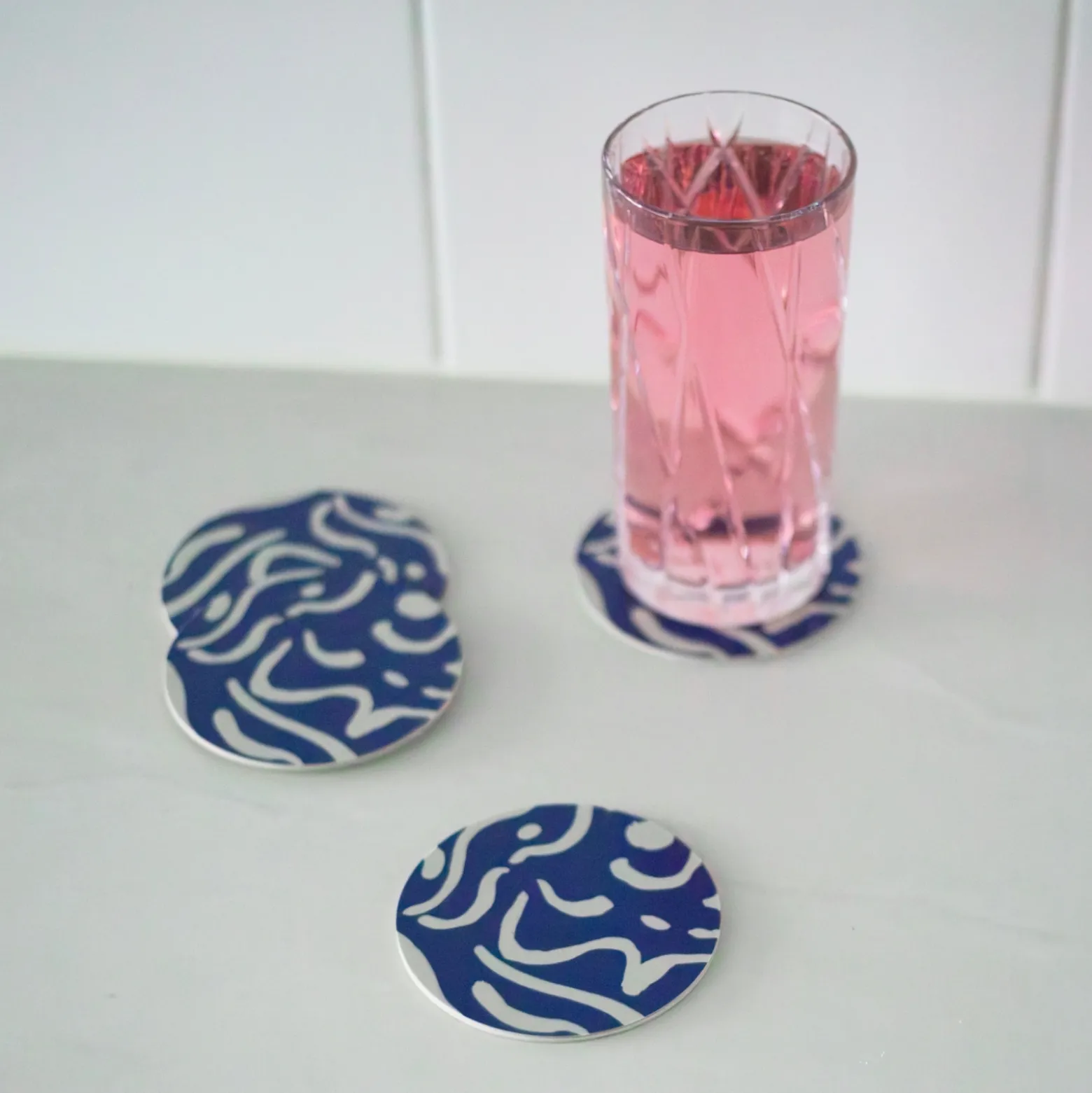 Glasunderlägg Virvla 9 cm 4-p